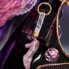 A golden circular diamond-encrusted pendant in the shape of a high heel Specification image